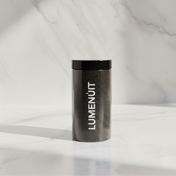 Lumenuit Colored Wax Pearls in a sleek, black speckled jar with a lid, ideal for creating customizable, vibrant candles in heat-resistant vessels.