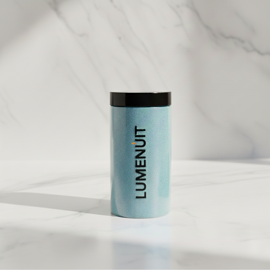 Lumenuit Colored Wax Pearls canister on marble, showcasing customizable candle-making pearls for vibrant, sustainable, and versatile home ambiance.