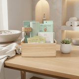 Wooden box with spa-related products on a wooden table.